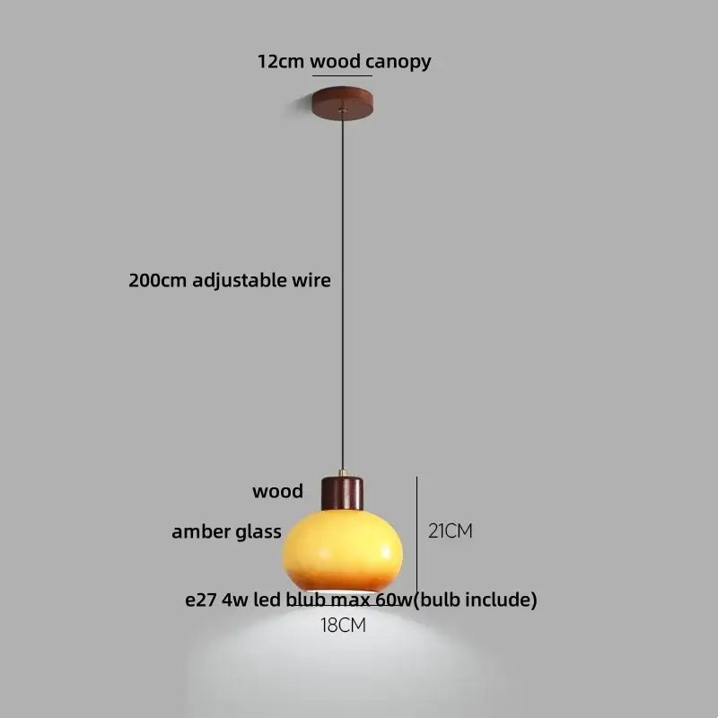 Decorbites amber glass pendant light with warm amber glass and wooden canopy, adjustable wire for rustic interiors