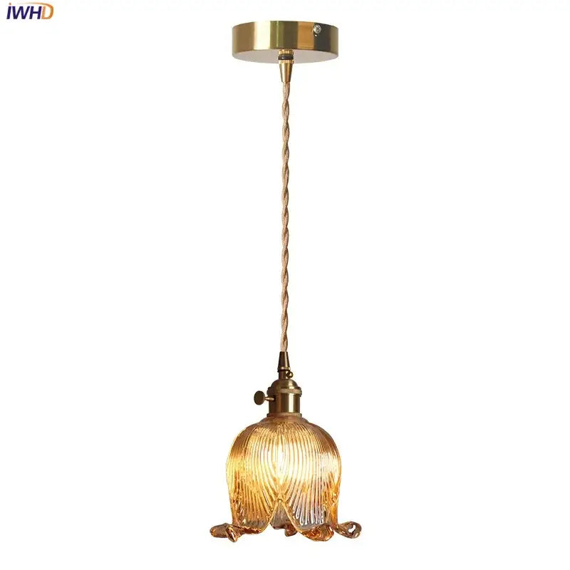 Decorbites amber glass led pendant light with golden brass and textured amber-tinted glass shade shaped like flower