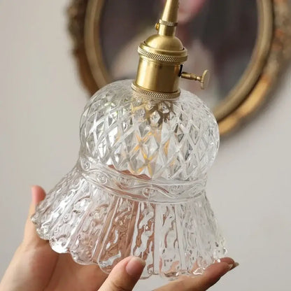 Clear cut decorbites amber glass led pendant light with brass socket and intricate diamond-cut patterns in amber glass
