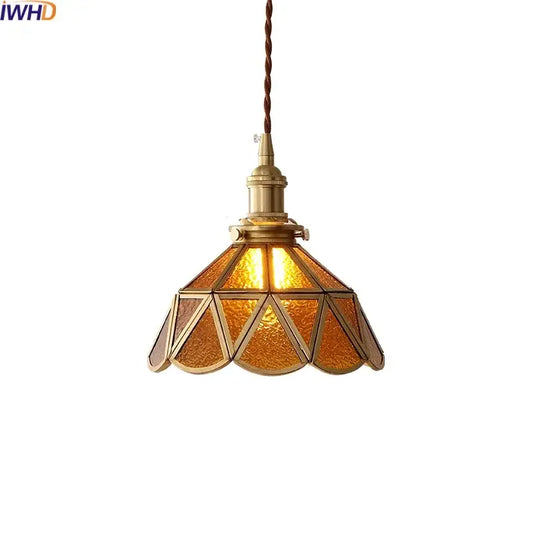 Vintage-style DecorBites amber glass led pendant light with textured amber glass panels and brass frame suspended by brown cord