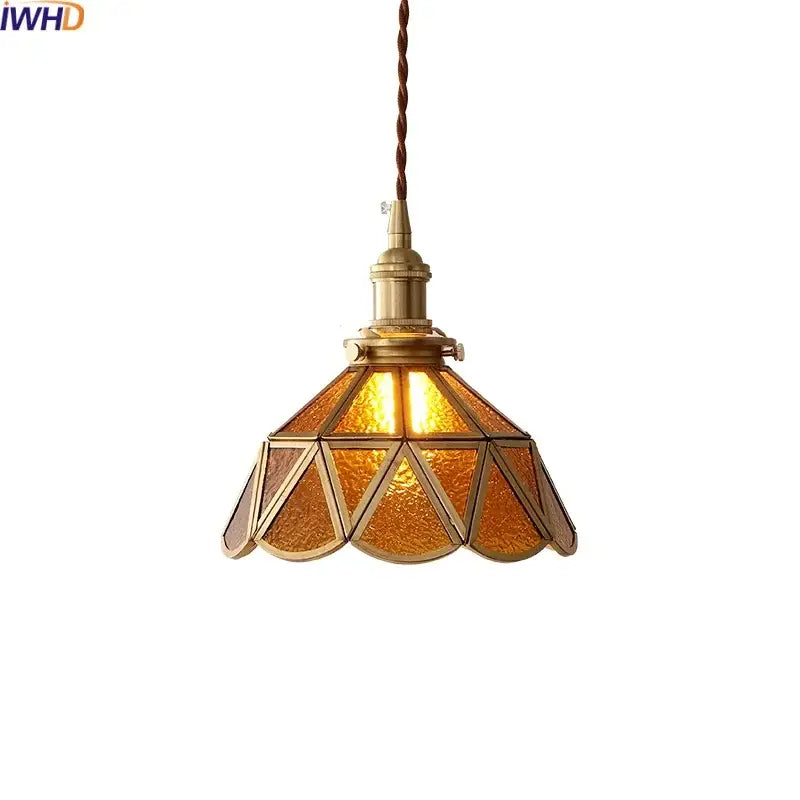 Vintage-style DecorBites amber glass led pendant light with textured amber glass panels and brass frame suspended by brown cord