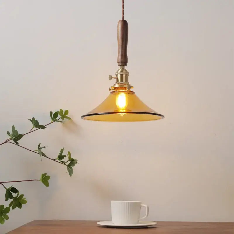 Decorbites amber glass led pendant light with warm amber glass shade walnut handle and brass hardware for dining room
