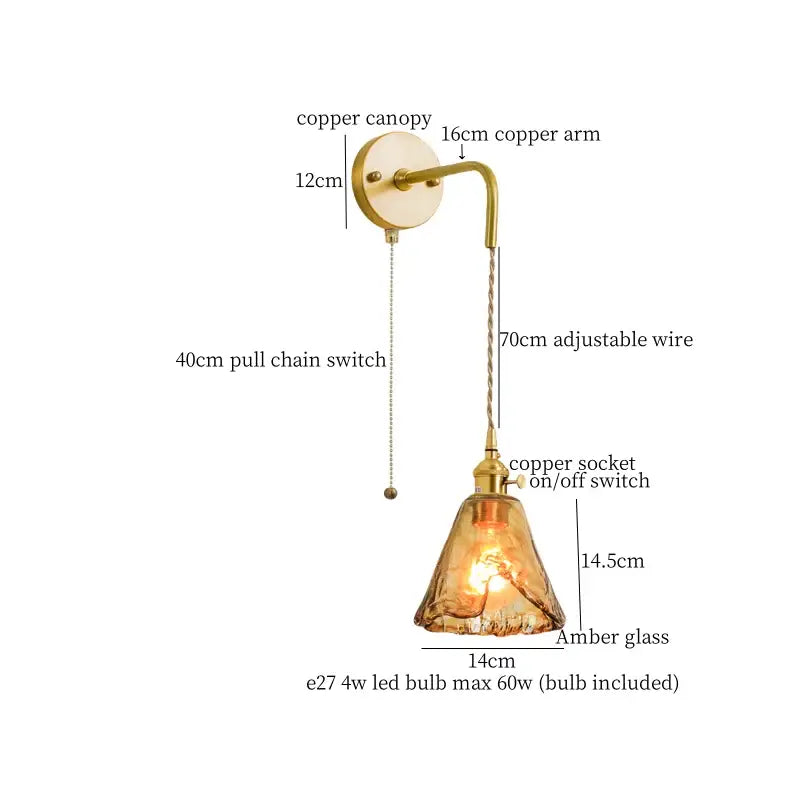 DecorBites™ amber glass led wall lamp with antique brass finish and adjustable copper arm for minimalistic bedroom lighting