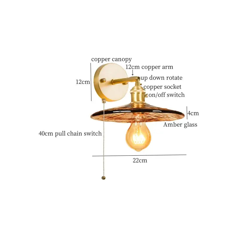 Copper wall lamp with amber glass shade and exposed bulb featuring led wall lamp design for bedroom lighting