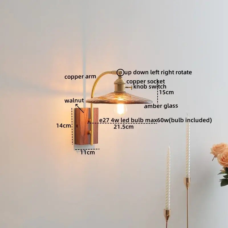 Copper-arm wall lamp with a walnut wood base and amber glass led shade by DecorBites amber glass for modern decor