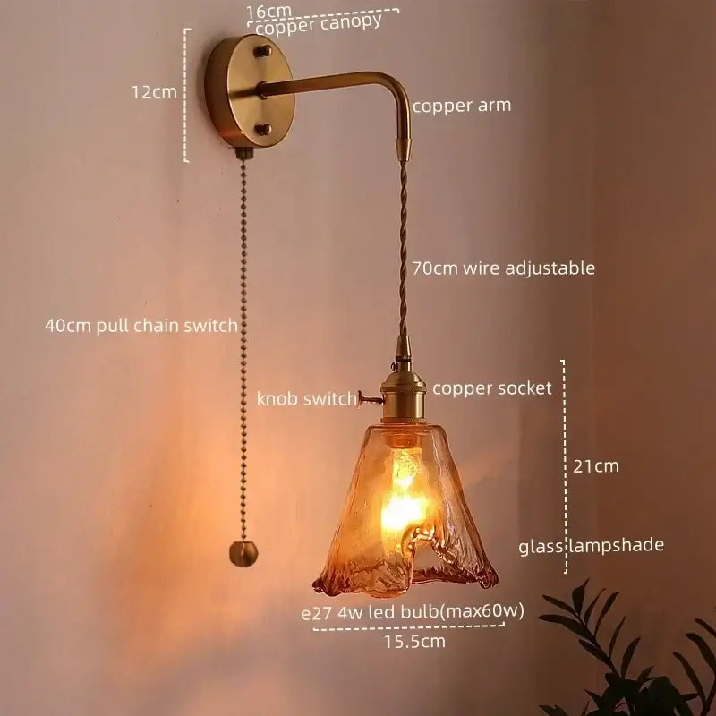 Copper-finished wall lamp with textured amber glass led shade and adjustable twisted wire arm by DecorBites amber glass