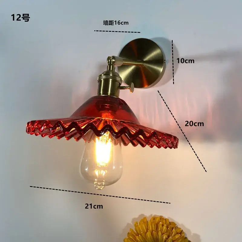 Decorbites amber glass led wall light fixture with red scalloped lampshade and brass mounting hardware