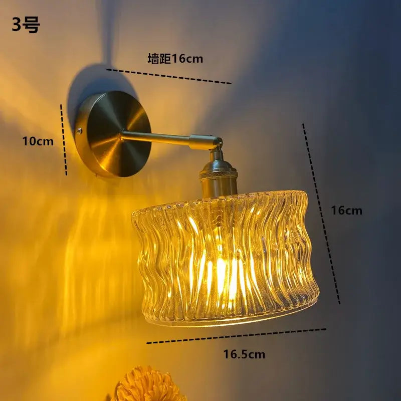 DecorBites amber glass LED wall light fixture with textured glass shade and brass finish Nordic modern sconce