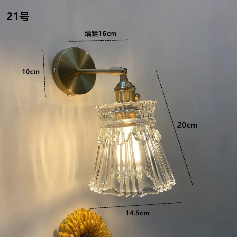 Decorbites amber glass led wall light fixture with clear fluted glass shade and brass-finished metal arm