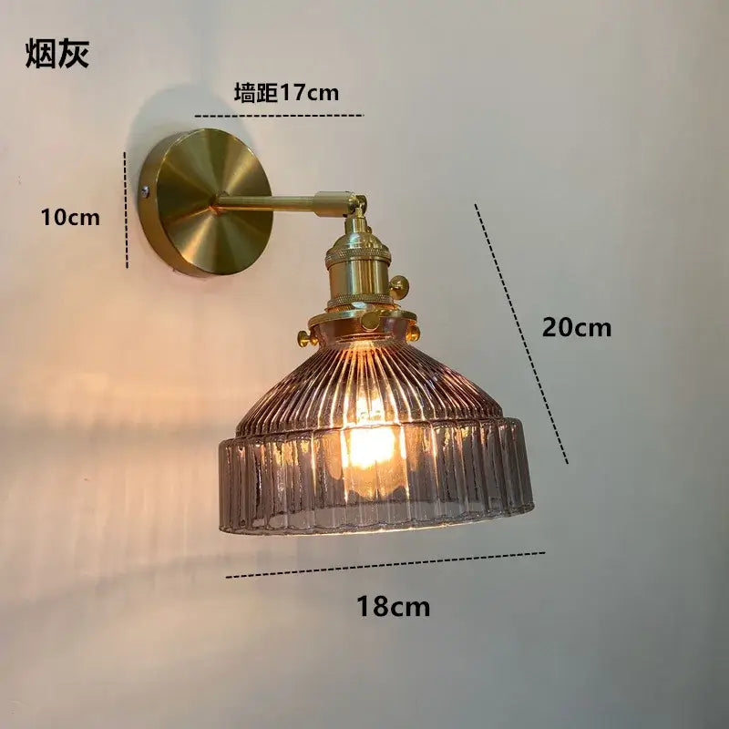 Vintage-style brass wall light fixture with textured smoked amber glass shade nordic modern sconce by decorbites