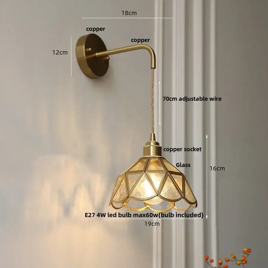 Brass-finished DecorBites amber glass led wall light with geometric shade and adjustable copper wire arm for bedroom and staircase