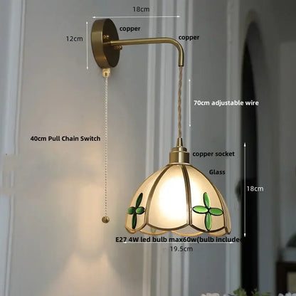 Antique brass-finished led wall light with green clover stained glass shade and adjustable copper wire by DecorBites for bedroom