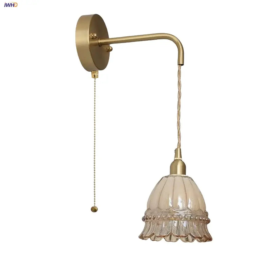 Antique brass-finished DecorBites amber glass LED wall light with frosted ruffled glass shade and pull chain switch