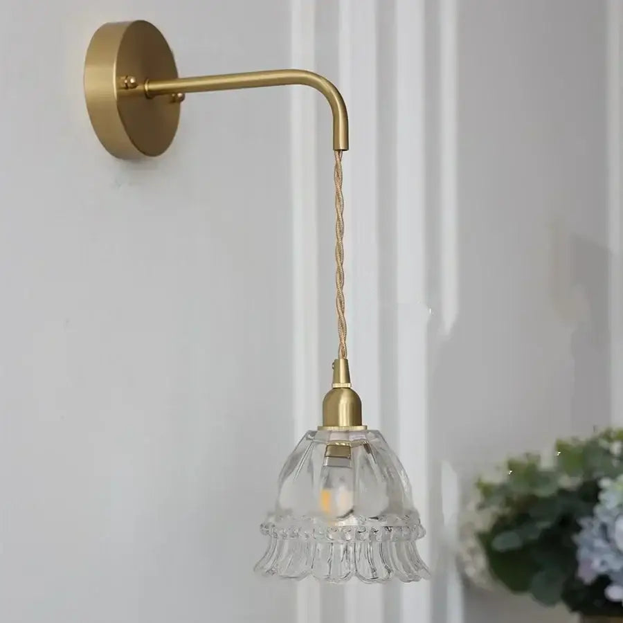 DecorBites amber glass led wall light features a delicate brass sconce with clear fluted glass and twisted cord pull chain