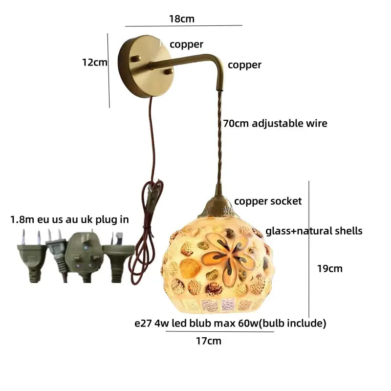 Decorbites amber glass led wall light features a spherical glass shade with natural shells and copper hardware for home décor