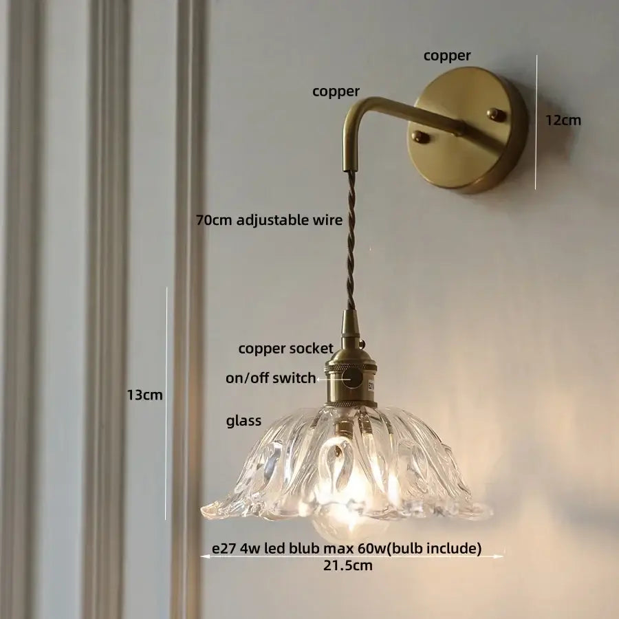 Antique brass finished copper wall sconce with clear petal shaped amber glass led shade and adjustable 70cm wire by decorbites amber glass