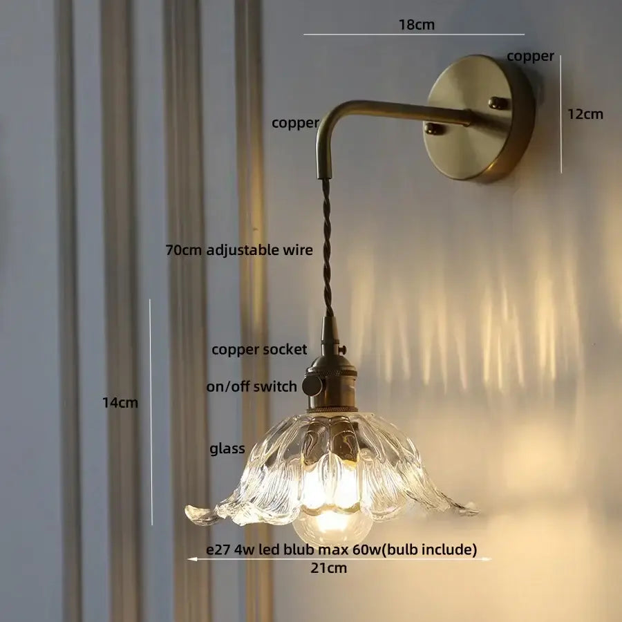 Vintage-style DecorBites amber glass wall sconce with copper finish petal-shaped shade and adjustable 70cm wire