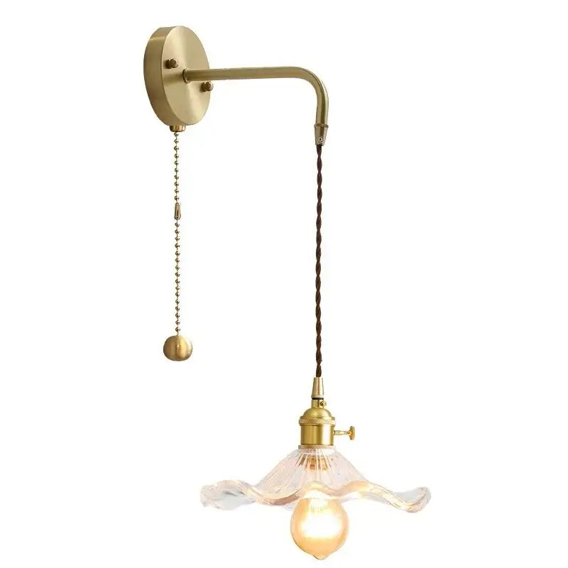 Brass decorbites amber glass wall sconce with twisted brown cord and clear ruffled glass shade for indoor lighting