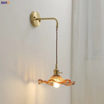 DecorBites amber glass wall sconce with brass arm and amber ruffled glass shade for indoor home lighting