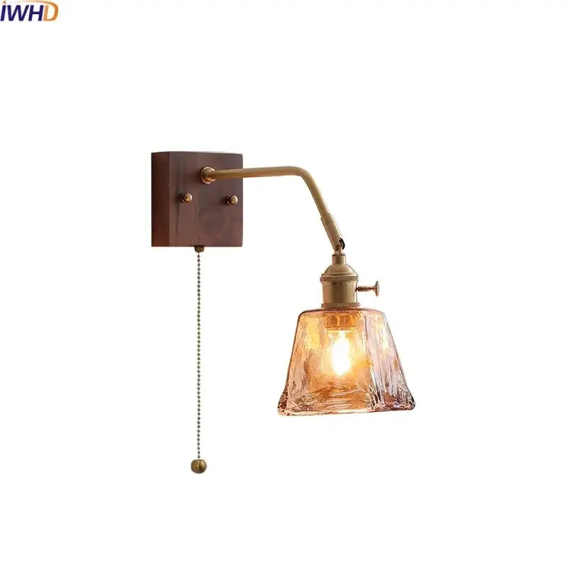 Antique brass wall sconce with adjustable arm and textured amber glass decorbites amber glass led reading lamp