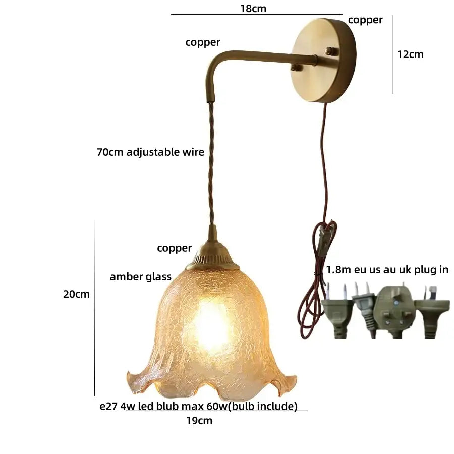 Antique brass-finished copper wall sconce with decorbites amber glass led bell-shaped shade and pull chain switch
