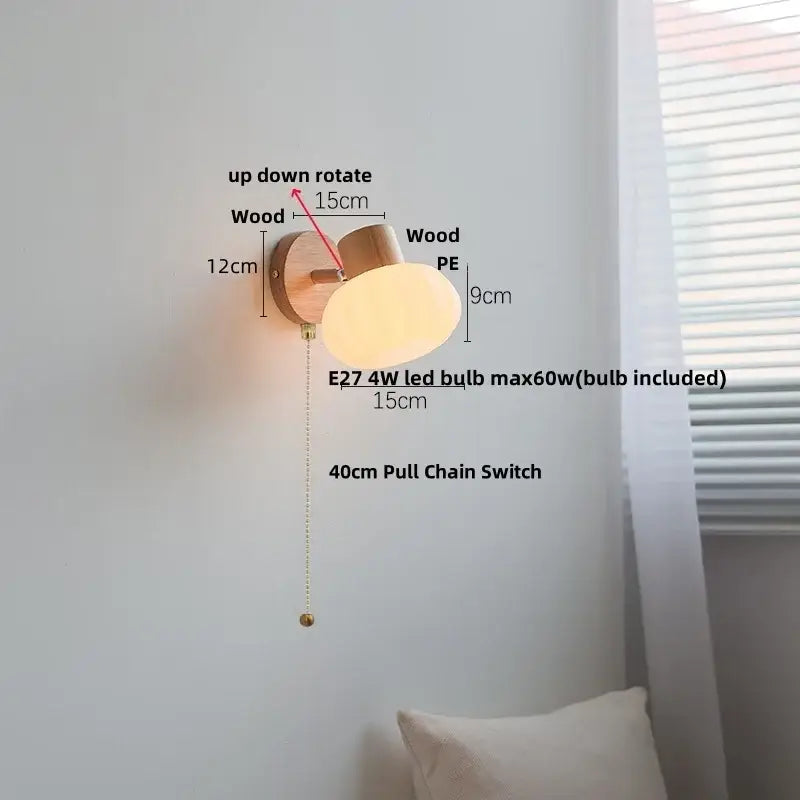 Warm-toned oval decorbites amber glass led wall sconce with natural wood base and frosted pe diffuser for stair lighting