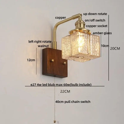 DecorBites amber glass LED wall sconce with antique brass finish and walnut wood base for living room lighting