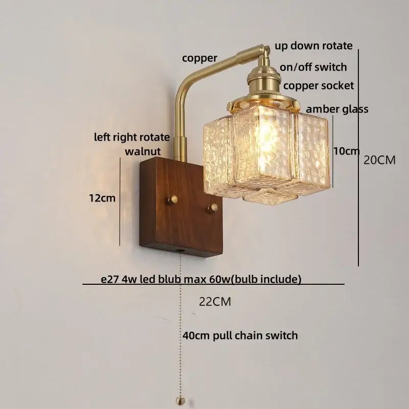 DecorBites amber glass LED wall sconce with antique brass finish and walnut wood base for living room lighting