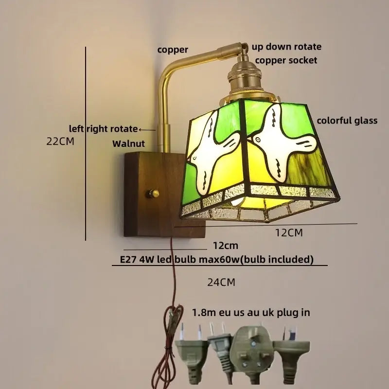 Decorbites amber glass wall sconce with brass finish, walnut wood, and stained glass shade featuring two white birds