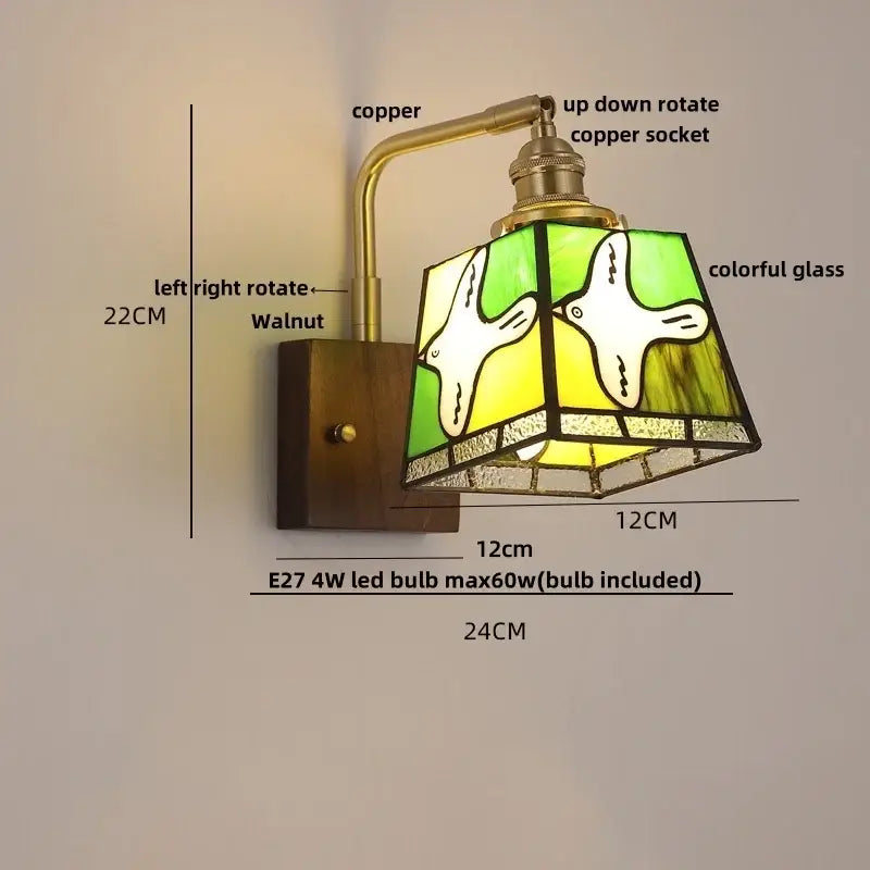 DecorBites amber glass wall sconce with walnut wood base and copper arm featuring stained glass birds shade