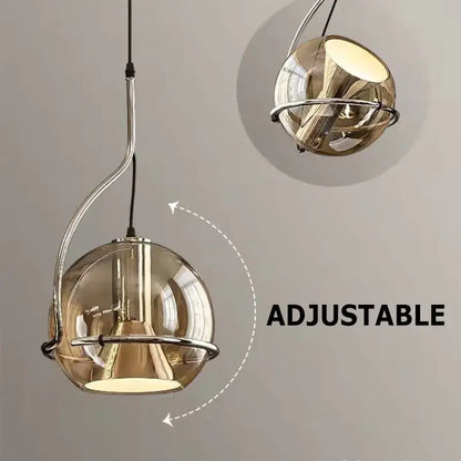 Adjustable spherical pendant light with smoked amber glass and chrome metal frame by DecorBites amber glass perfect for kitchen