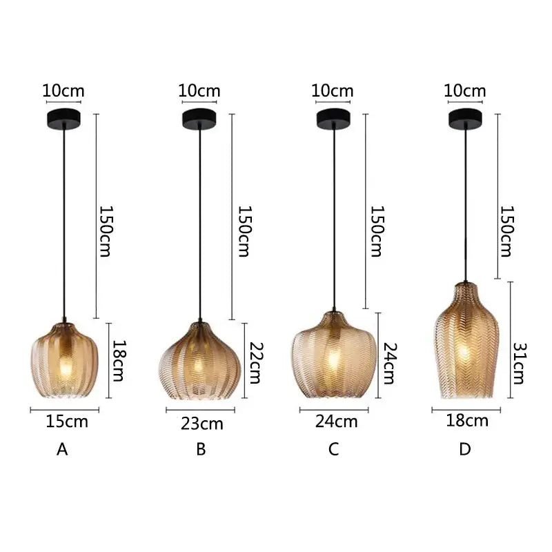 Four decorbites amber glass pendant lights with textured amber glass shades and black metal fixtures for kitchens and bedrooms