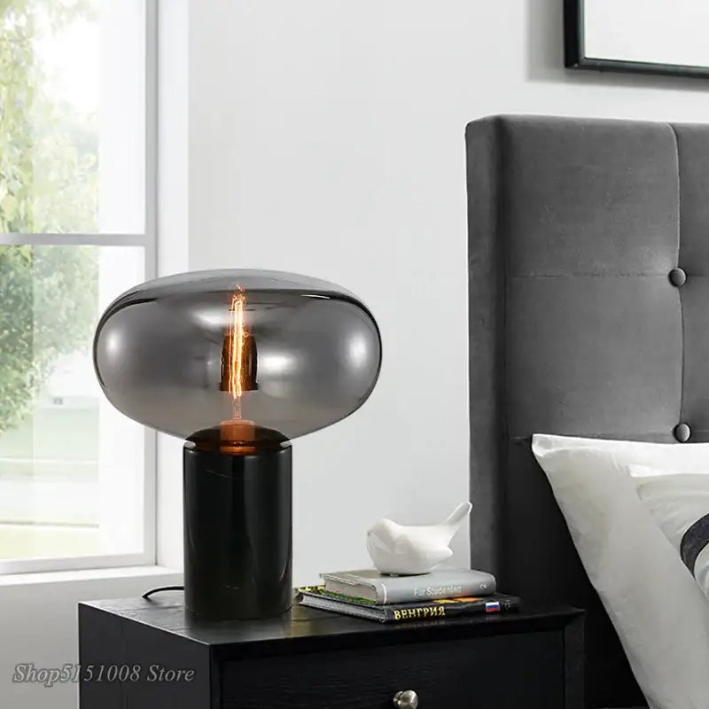 DecorBites amber glass table lamp with sleek black base and smoked glass dome for modern living spaces