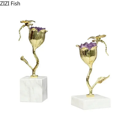 Gold-plated dragonfly decor sculpture featuring amethyst flower ornaments with purple gemstone centers on marble bases