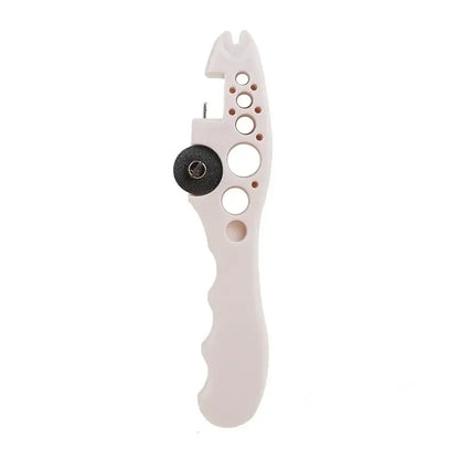 White plastic jewelry wire cutter with black adjustment knob and size holes as DecorBites™ ampoule opener nurse assistant tool