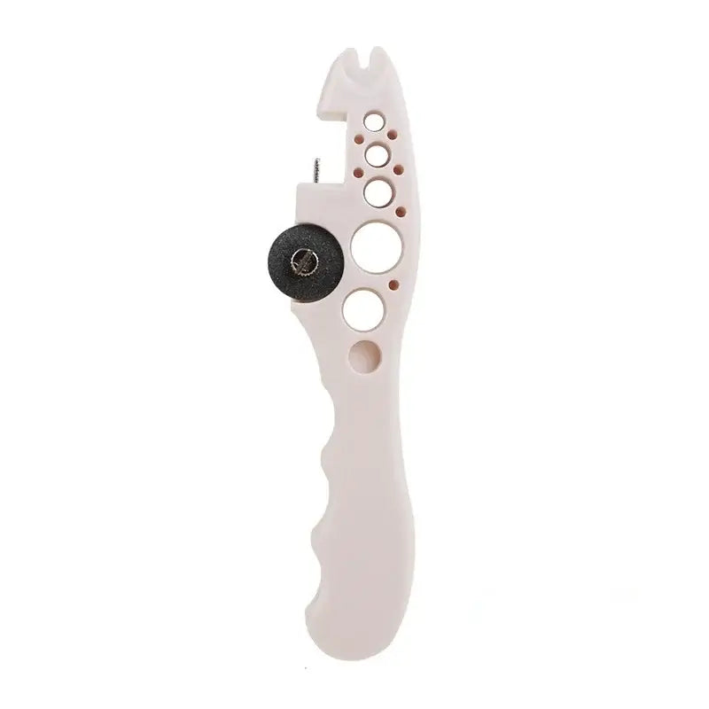 White plastic jewelry wire cutter with black adjustment knob and size holes as DecorBites™ ampoule opener nurse assistant tool