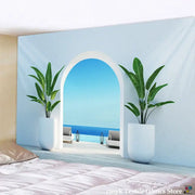 Light blue DecorBites ancient architecture tapestry with white arched doorway and green plants for tapestry wall hanging