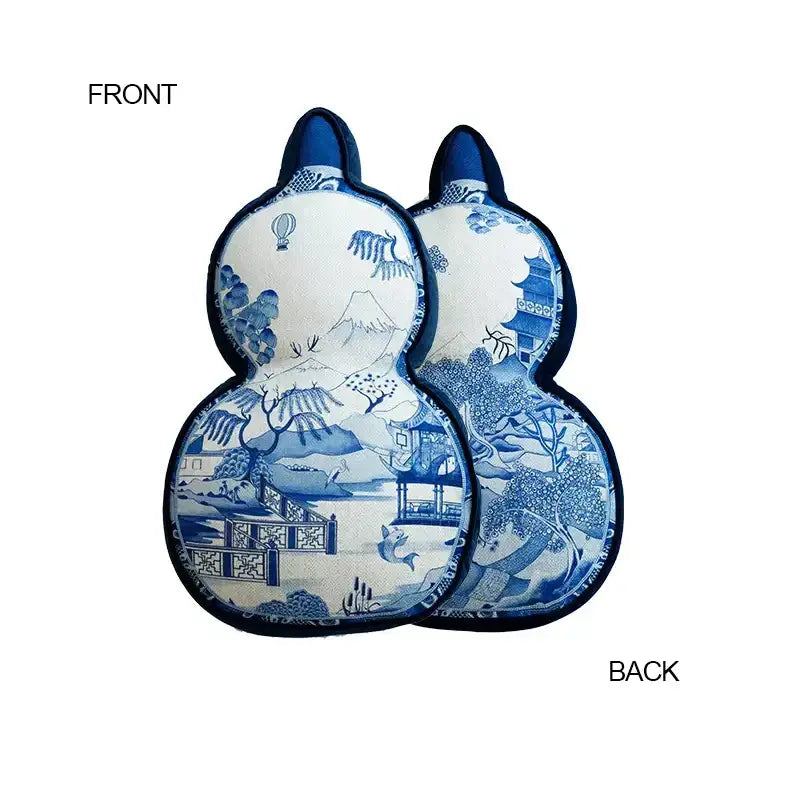 Blue and white porcelain-style gourd-shaped cushion cover featuring hand-painted ancient indigo jungle designs