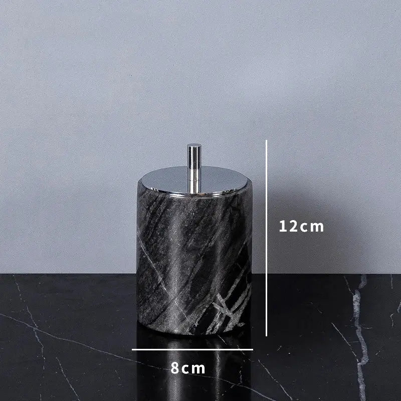 Black marble cylindrical container with silver lid and rod from DecorBites ancient wood grain marble bathroom set
