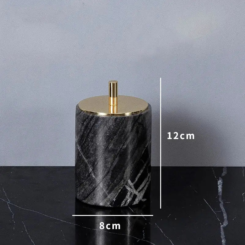 Black marble cylindrical container with gold-toned lid and knob from DecorBites™ ancient wood grain bathroom set