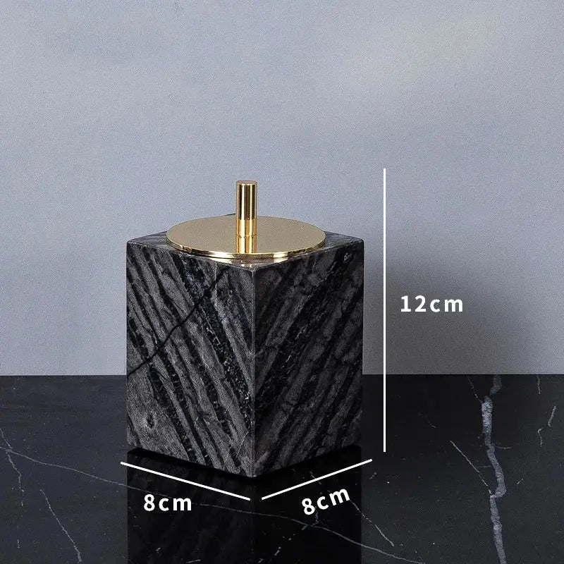 Black marble cube with gold-toned lid and stem from decorbites™ ancient wood grain marble bathroom set luxury accessory