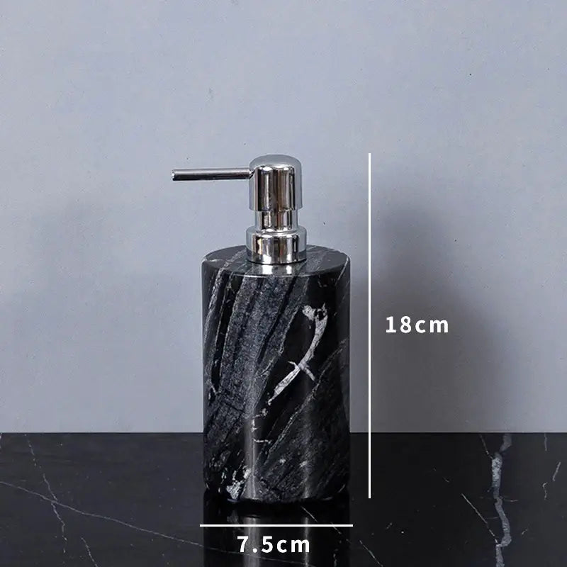 Black marble soap dispenser with a sleek chrome pump from decorbites ancient wood grain marble bathroom set