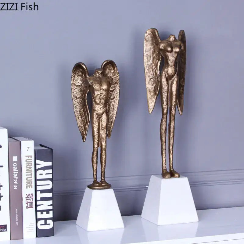 Golden decorbites™ angel abstract figures sculpture with detailed wings cast iron on white triangular bases for home decor