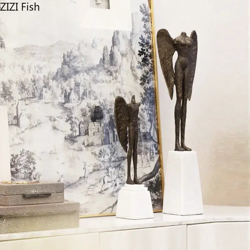 Bronze-colored decorbites™ angel abstract figures sculpture cast iron home decor statues with outstretched wings on white pedestals