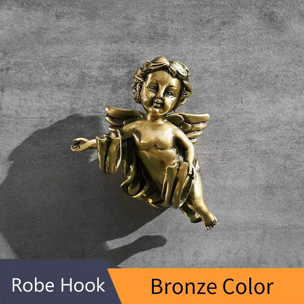 Bronze-colored angel brass towel hook with detailed wings and flowing robes for bathroom and garage wall mounted use