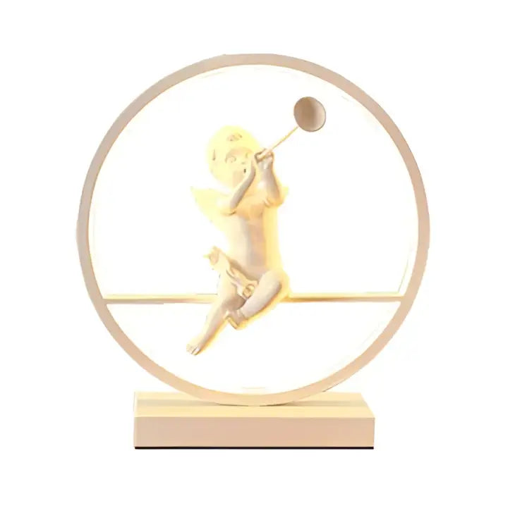 Golden cherub figurine encased in a circular frame with wooden base decorates the decorbites angel doll bird table lamp