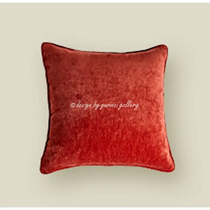 A plush rust-red velvet pillow cover with neatly stitched edges for decorbites angel eyes lumbar pillow