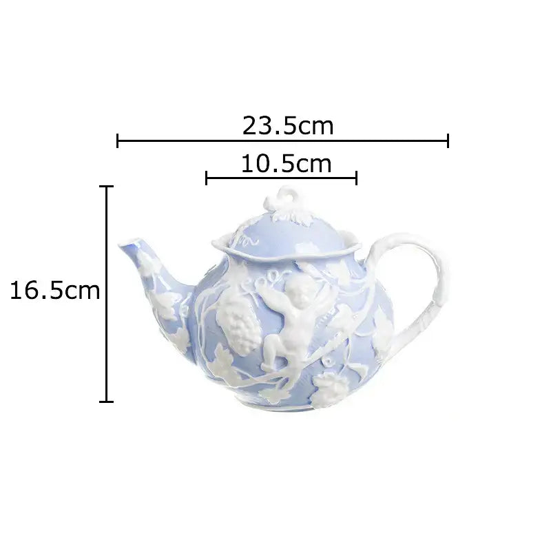 Delicate light blue porcelain teapot with intricate white angel figures relief in DecorBites ceramic dining set
