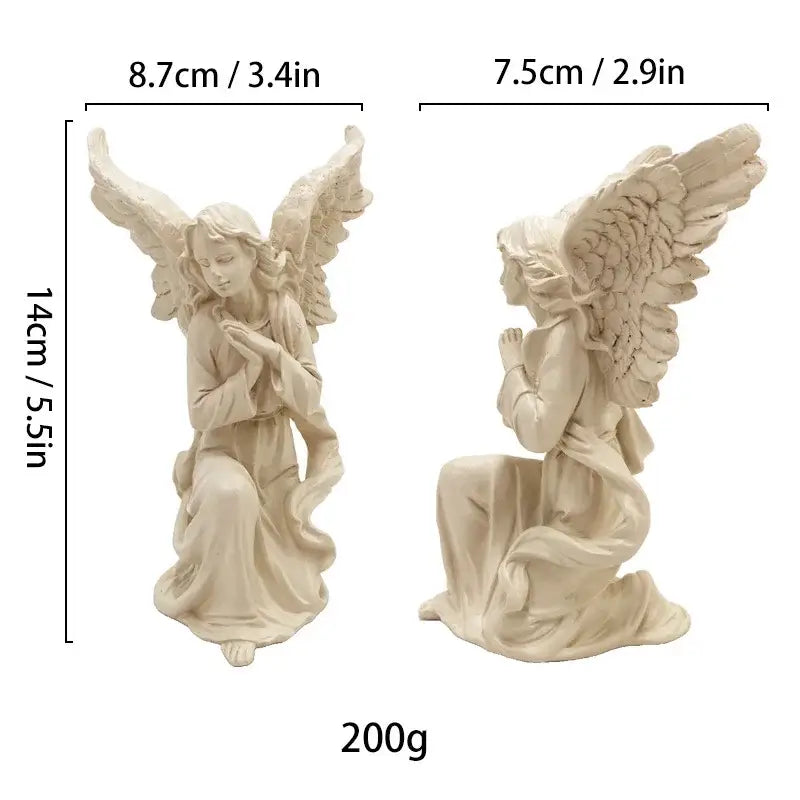 Two beige resin angel figurines kneeling with wings spread and hands clasped collectible statue for home decor