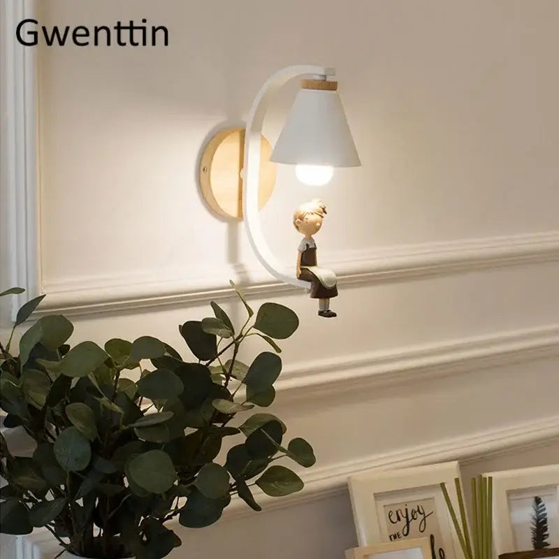 DecorBites™ angel girl bedroom wall sconces with white conical lampshade on curved wooden arm and child figurine